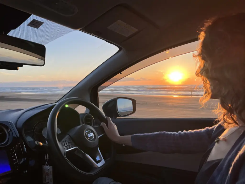 Vivian driving on the beach!